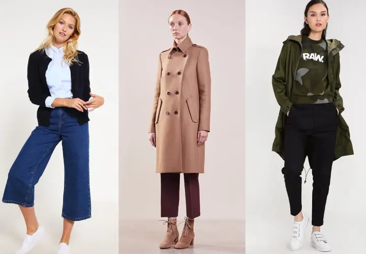 Trzy kobiety prezentują styl normcore: jedna w kardiganie i dzwonach, druga w beżowym płaszczu, trzecia w parkze i czarnych spodniach.