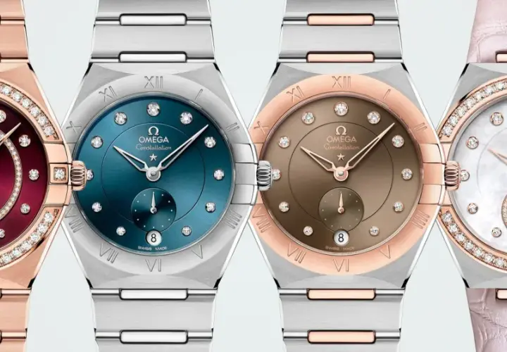 Cztery damskie zegarki Omega Constellation z tarczami w różnych kolorach i zdobieniami z diamentów.