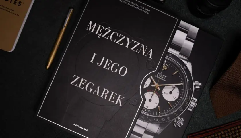 Okładka książki "Mężczyzna i jego zegarek" z widocznym zegarkiem Rolex Daytona.