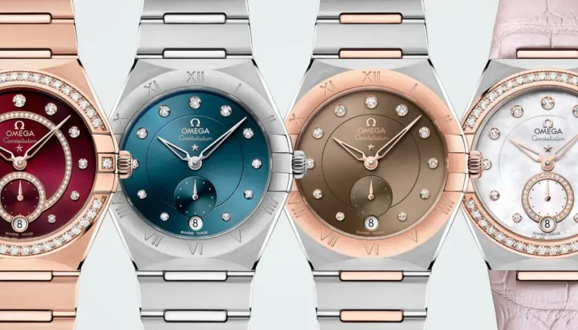 Cztery damskie zegarki Omega Constellation z tarczami w różnych kolorach i zdobieniami z diamentów.
