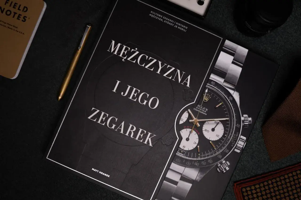 Okładka książki "Mężczyzna i jego zegarek" z widocznym zegarkiem Rolex Daytona.
