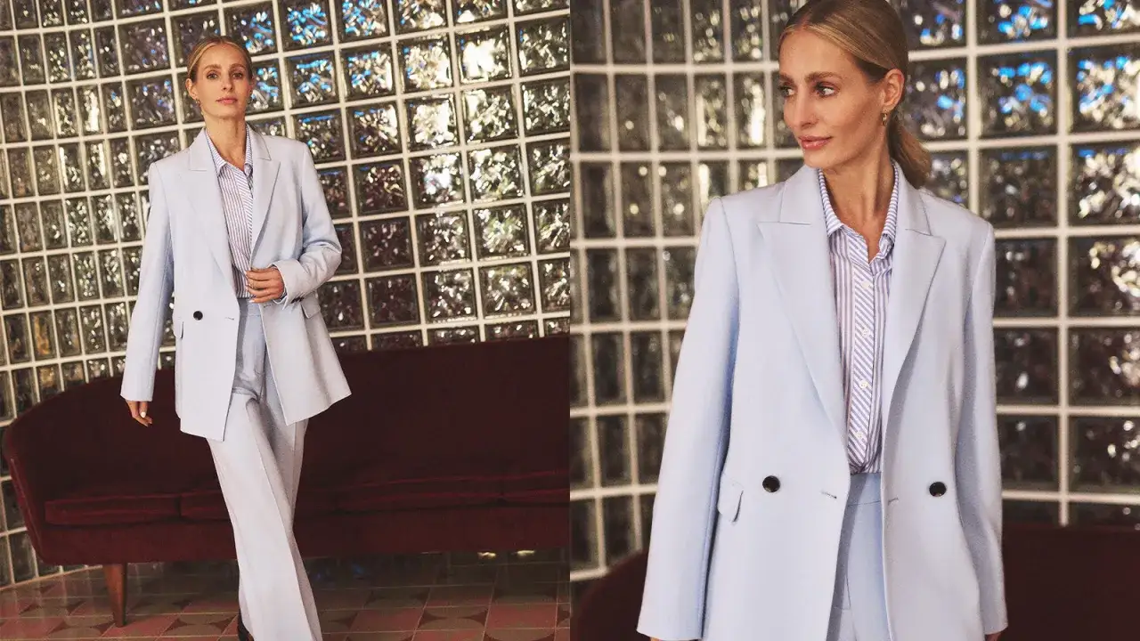 Elegancki jasnoniebieski garnitur damski, idealny jako dress code nauczyciela. Klasyczna stylizacja z marynarką i spodniami.